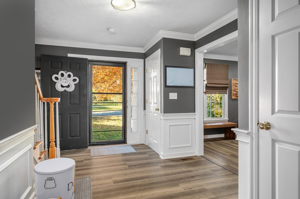 4 Horseneck Road Shrewsbury, MA 01545 - Photo 9 of 33 a view of a hallway with wooden floor and a window