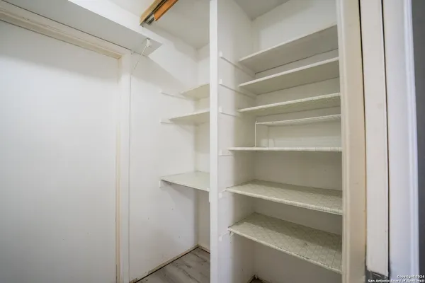 a storage room with washer and dryer