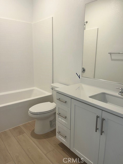 8421 Gabrielino Court Rancho Cucamonga, CA 91730 - Photo 6 of 8 a bathroom with a sink a toilet and shower