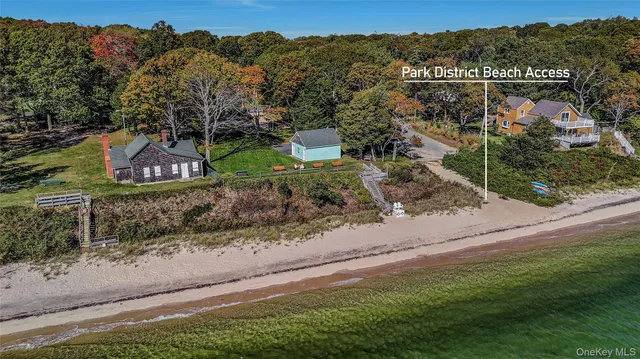 a view of a street with a garden