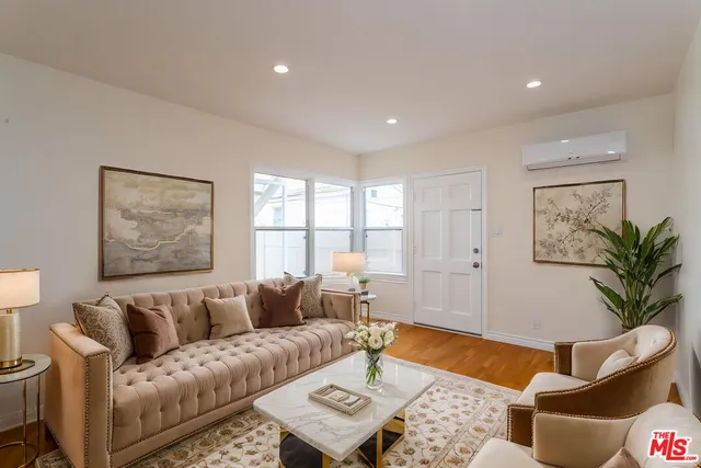 a living room with furniture and a couch