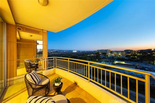 a view of a swimming pool with a lounge chair
