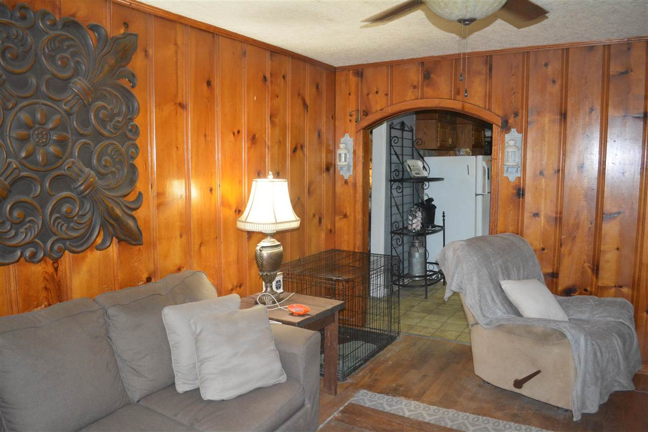1292 Sweet Lips Road Finger, TN 38334 - Photo 10 of 15 a living room with furniture and a fireplace