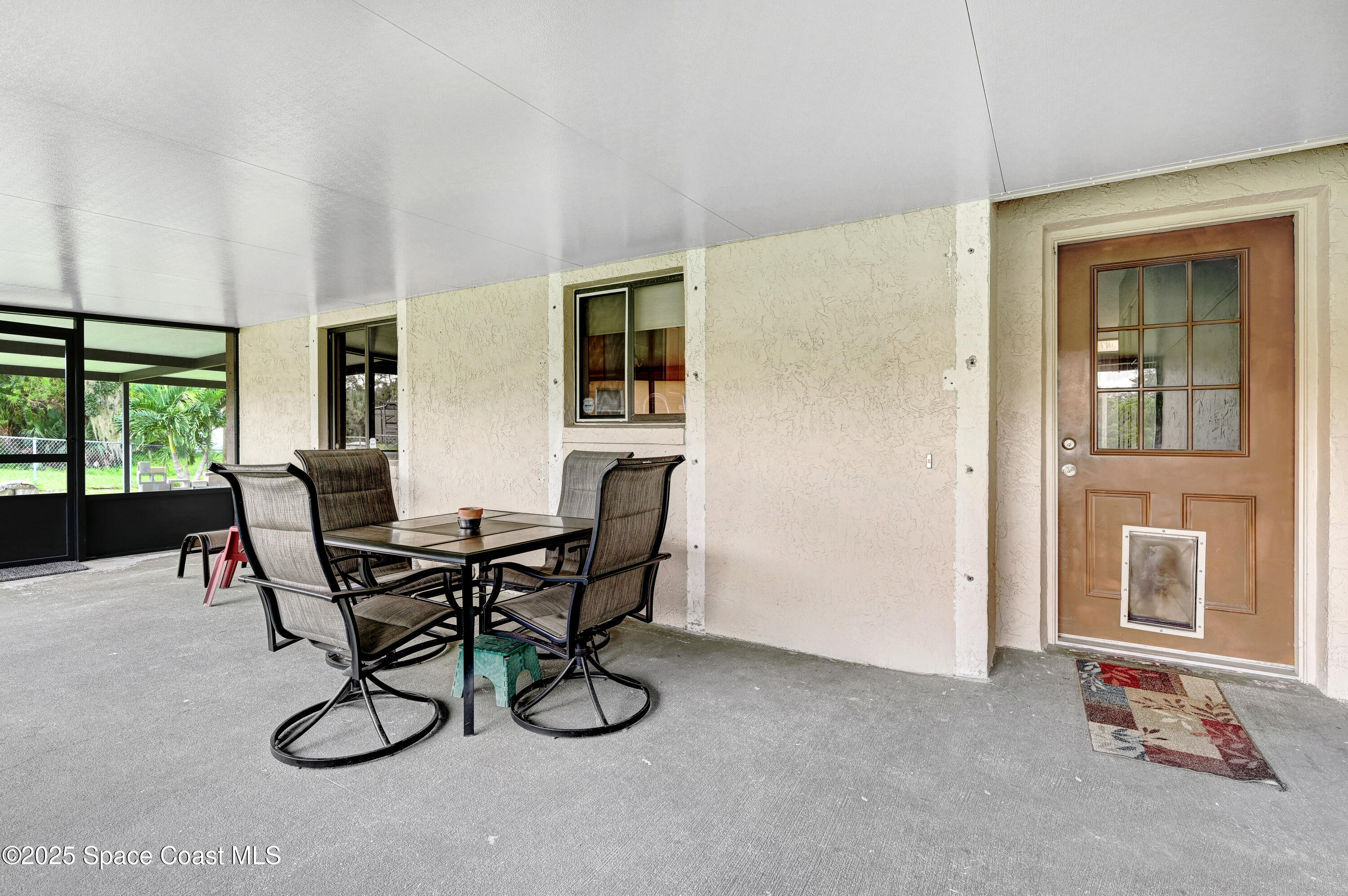 1078 Grapefruit Road Southeast Palm Bay, FL 32909 - Photo 2 of 36 DSC_0792