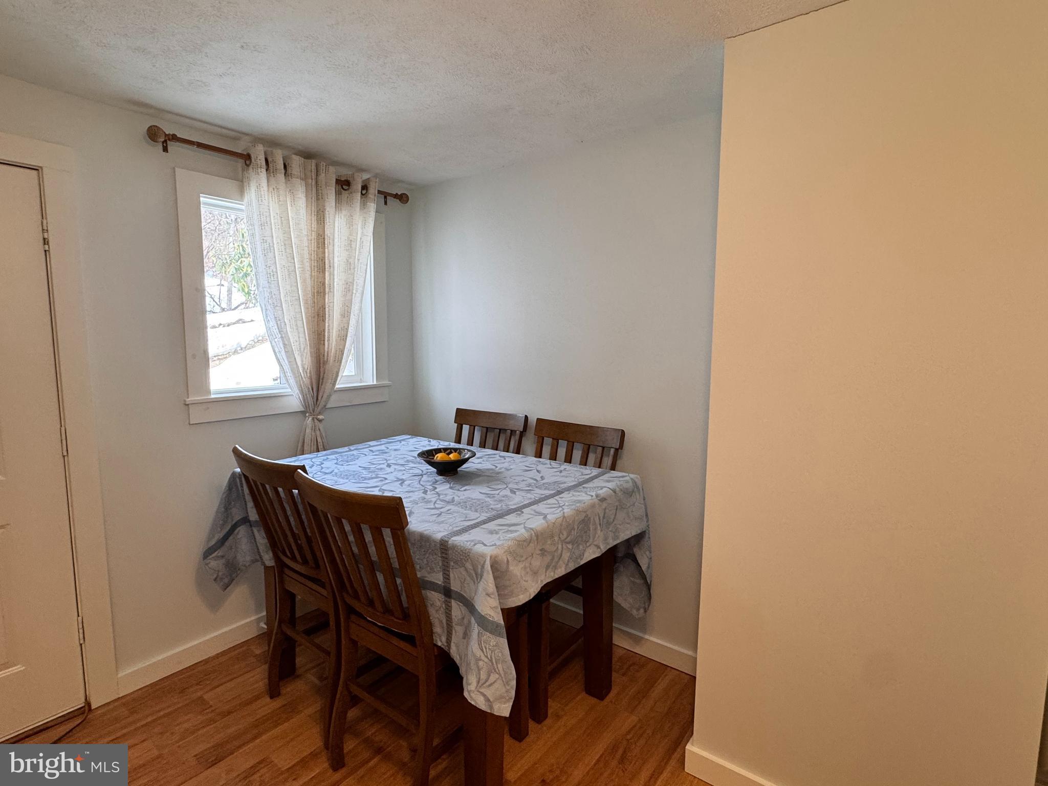 14 Summit Point Drive Front Royal, VA 22630 - Photo 21 of 32 a dining room with a table and chairs