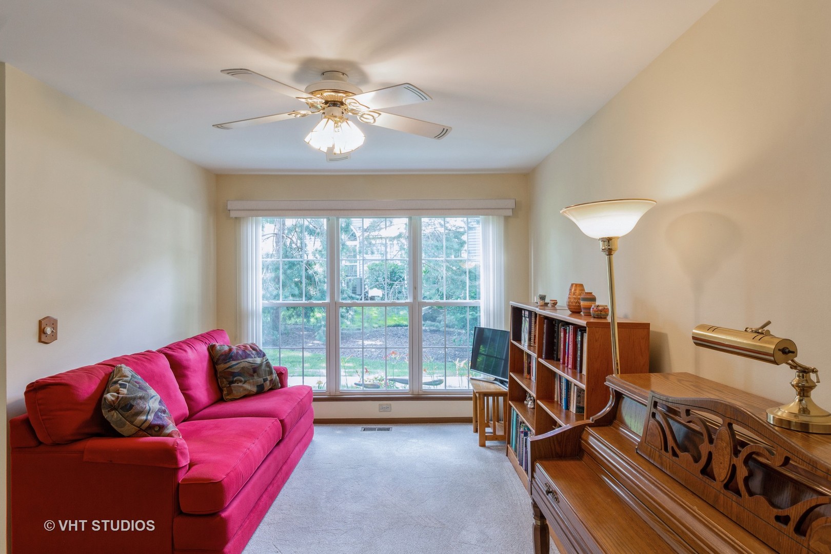 711 Bent Ridge Lane Elgin, IL 60120 - Photo 11 of 26 a living room with furniture and a chandelier