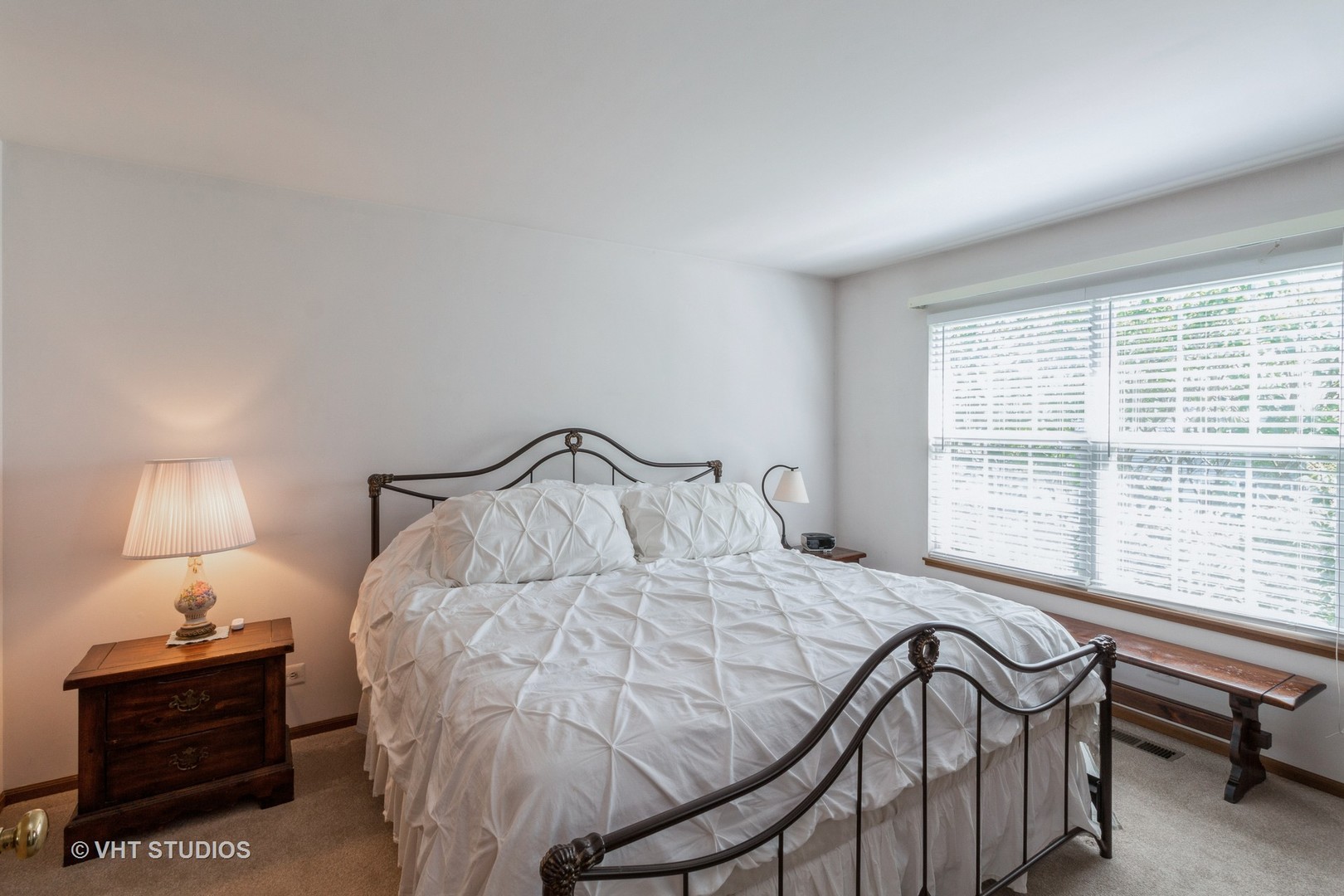 711 Bent Ridge Lane Elgin, IL 60120 - Photo 14 of 26 a bedroom with a bed and a window