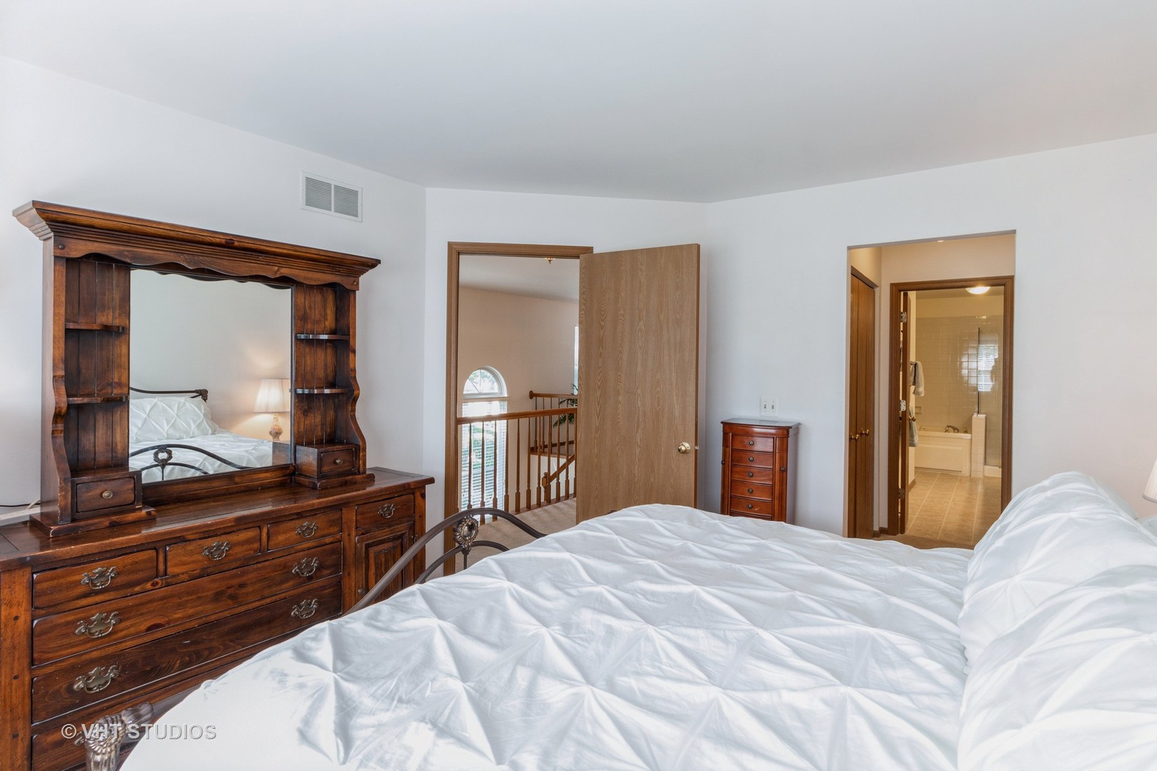 711 Bent Ridge Lane Elgin, IL 60120 - Photo 15 of 26 a bedroom with a bed and a dresser in it