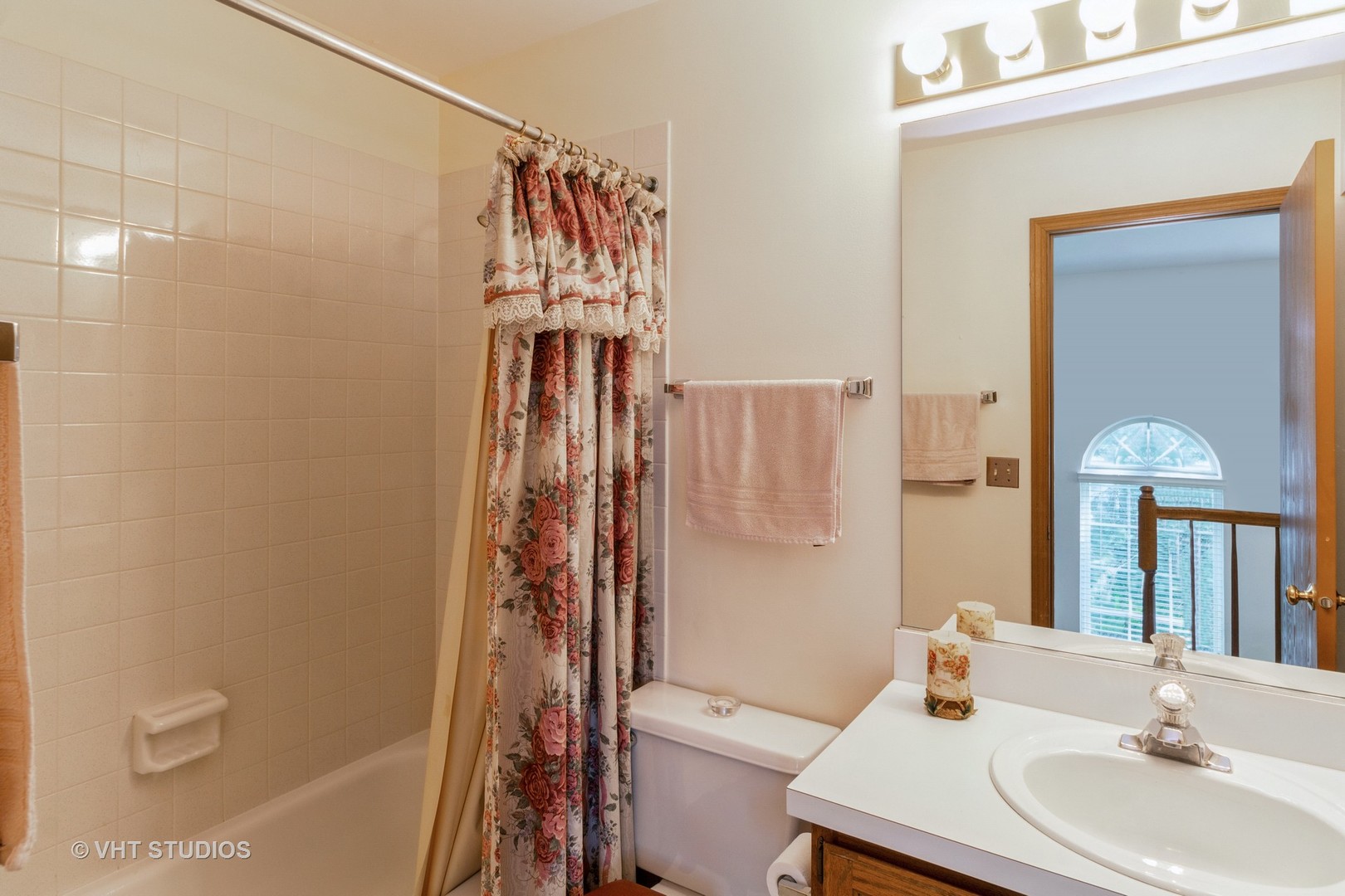 711 Bent Ridge Lane Elgin, IL 60120 - Photo 20 of 26 a bathroom with a sink toilet and shower