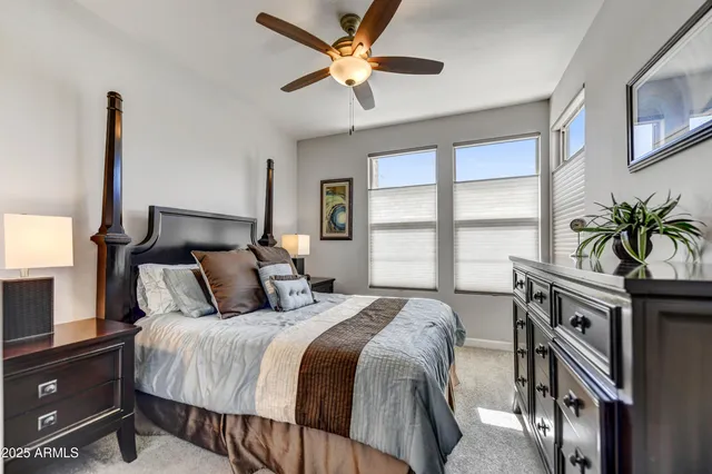 a bed room with a bed and a window