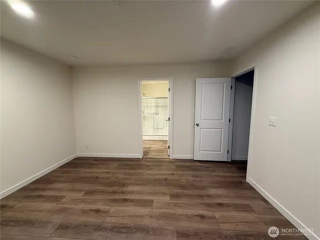 a bathroom with a sink a mirror and a vanity