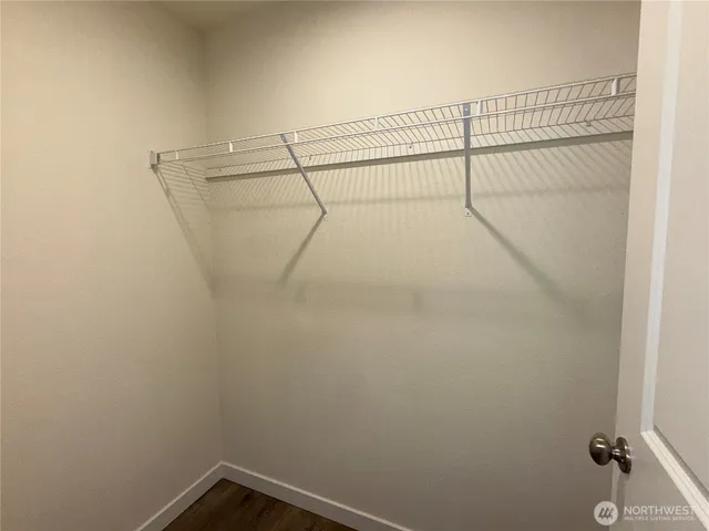 a bathroom with a tub and shower