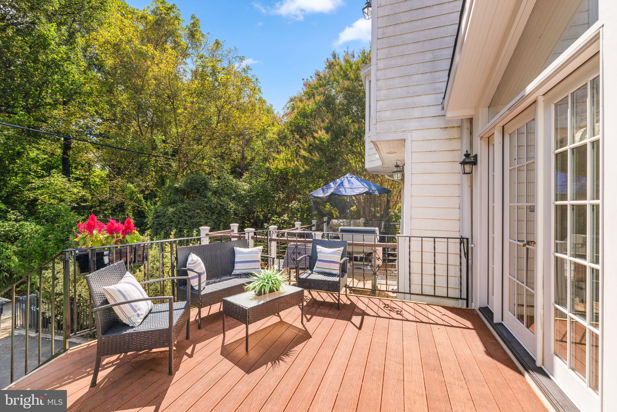 3762 W Street Northwest Washington, DC 20007 - Photo 10 of 41 a balcony with wooden floor and outdoor seating