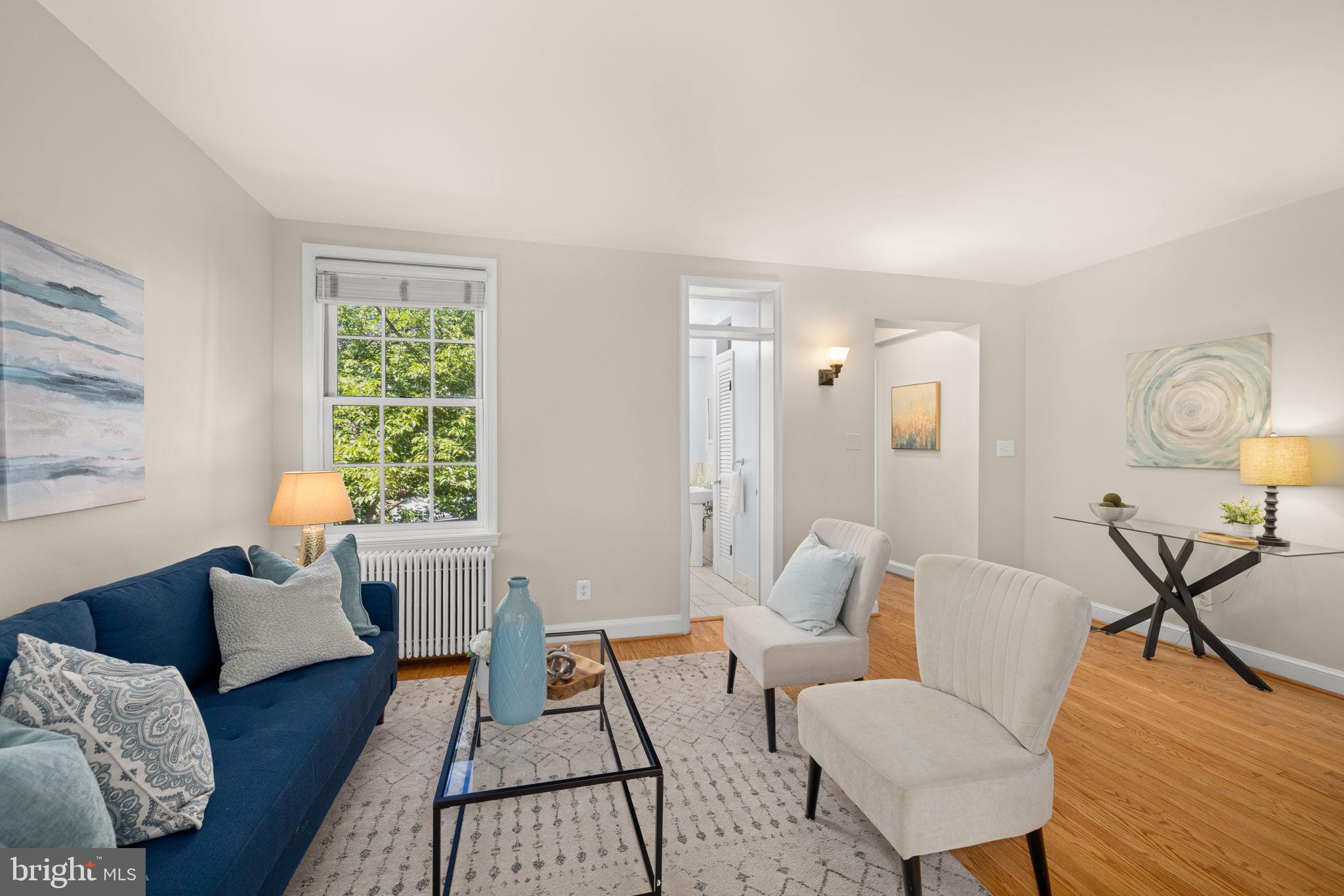 3762 W Street Northwest Washington, DC 20007 - Photo 15 of 41 a living room with furniture and a table
