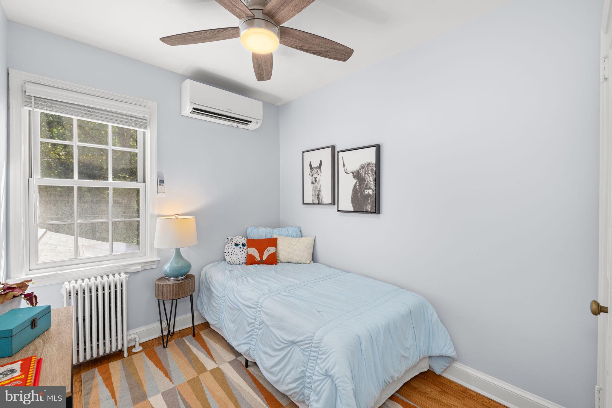 3762 W Street Northwest Washington, DC 20007 - Photo 27 of 41 a bedroom with a bed and a window