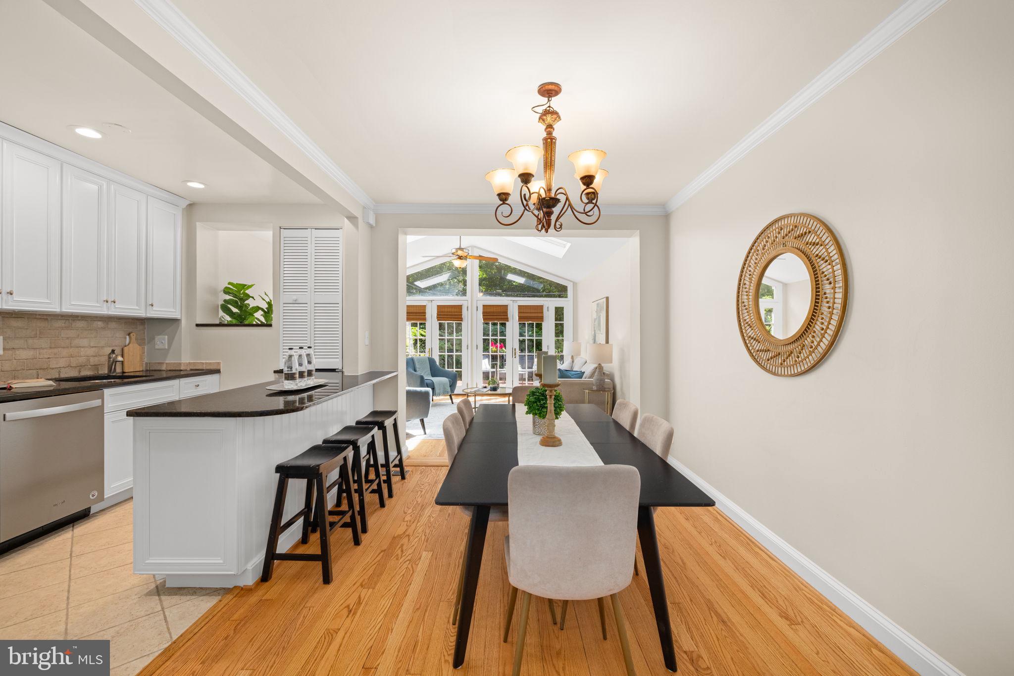 3762 W Street Northwest Washington, DC 20007 - Photo 3 of 41 a view of a dining room with furniture window and wooden floor
