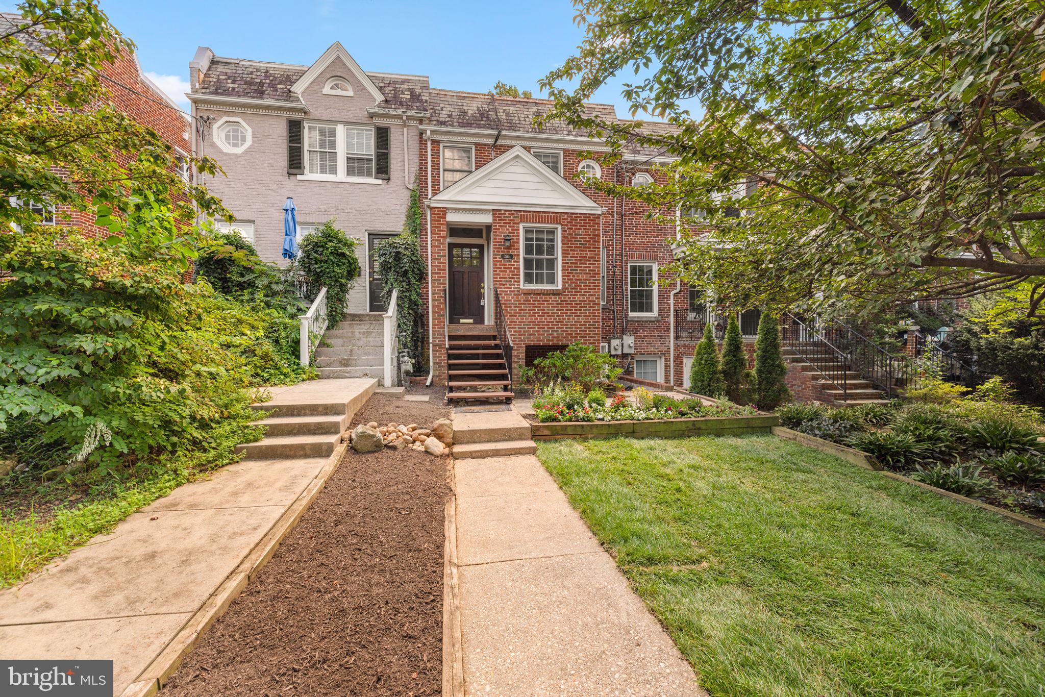 3762 W Street Northwest Washington, DC 20007 - Photo 40 of 41 a front view of a house with a yard