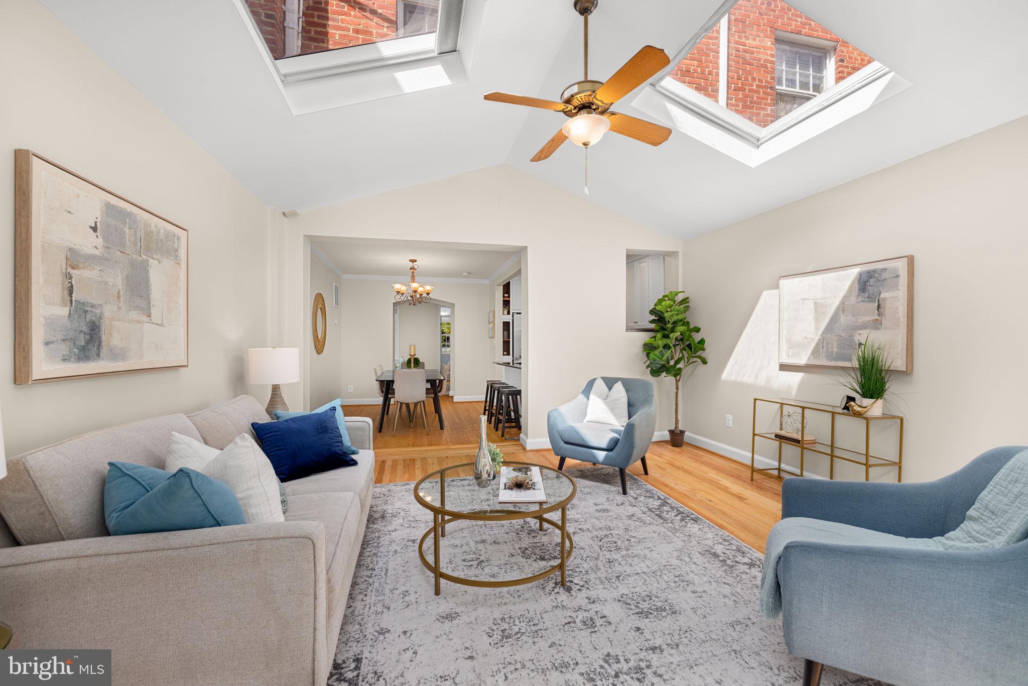 3762 W Street Northwest Washington, DC 20007 - Photo 6 of 41 a living room with furniture and a potted plant