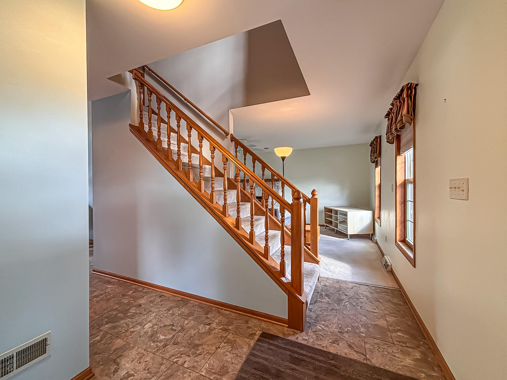 5900 Randal Lane Caledonia, WI 53402 - Photo 16 of 37 Foyer & Stairwell