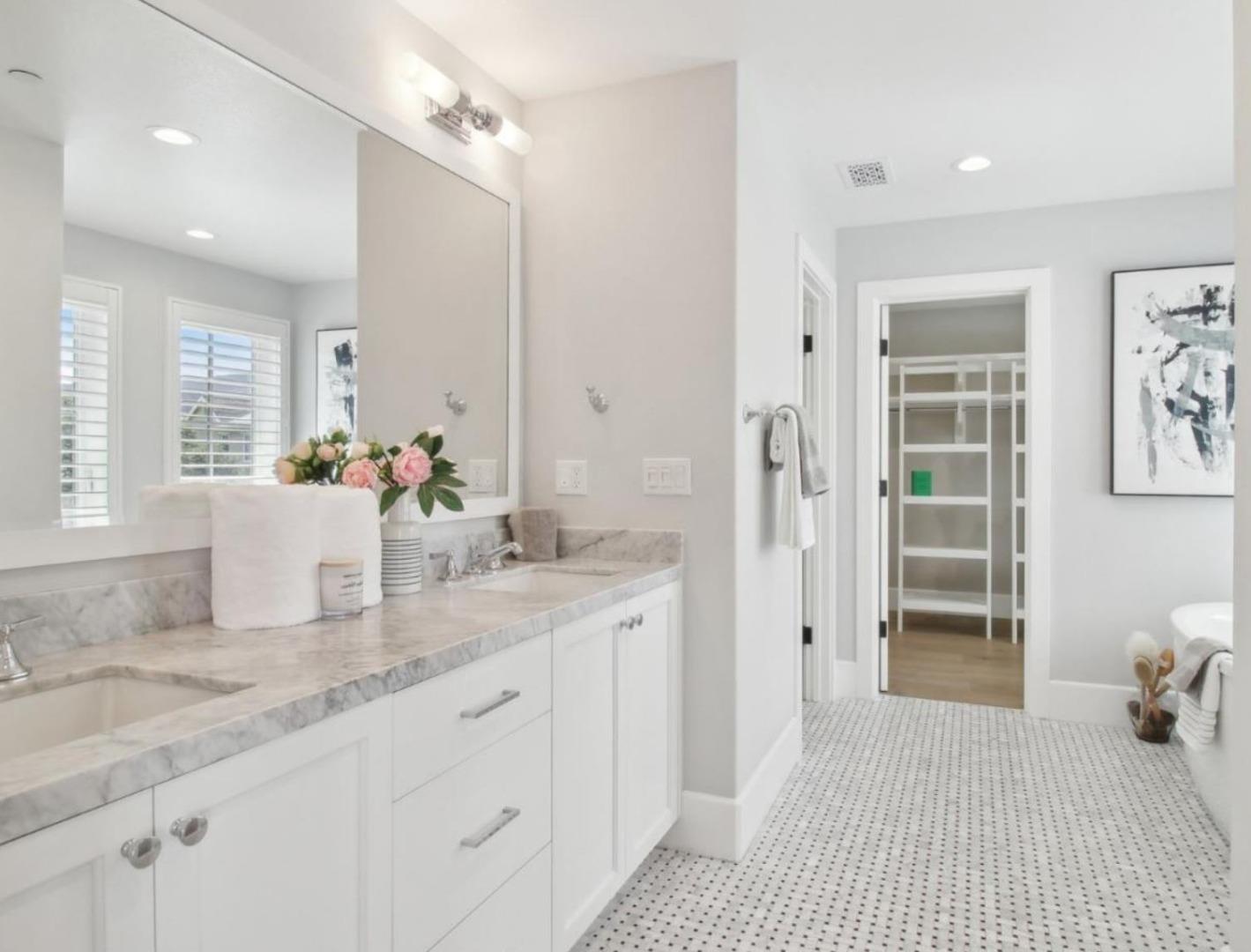 207 Oak Tree Circle Los Gatos, CA 95032 - Photo 7 of 16 a bathroom with a granite countertop sink and a mirror