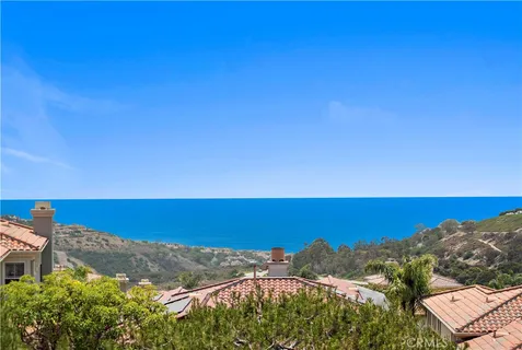 a view of a city with ocean view