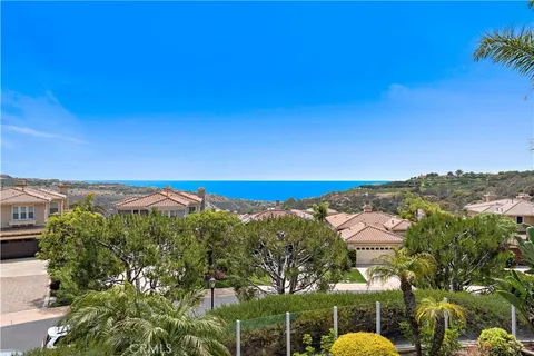 a view of a city with a building in the background