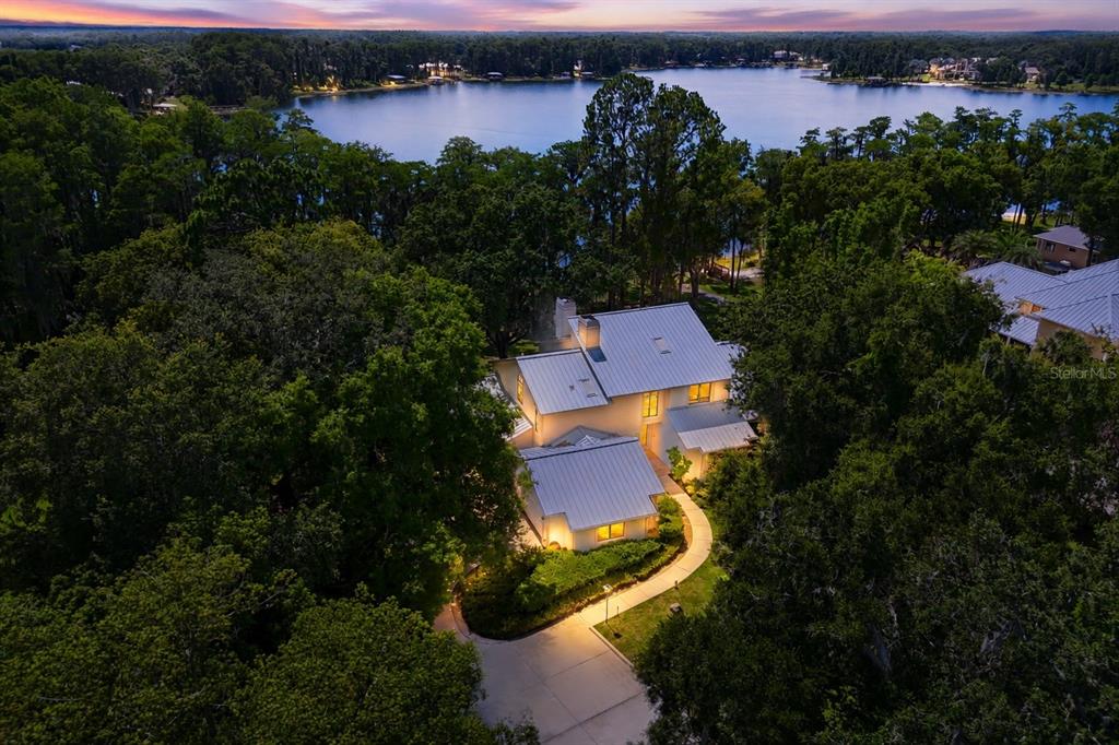 17810 Crawley Road Odessa, FL 33556 - Photo 3 of 76 an aerial view of a house with outdoor space and lake view
