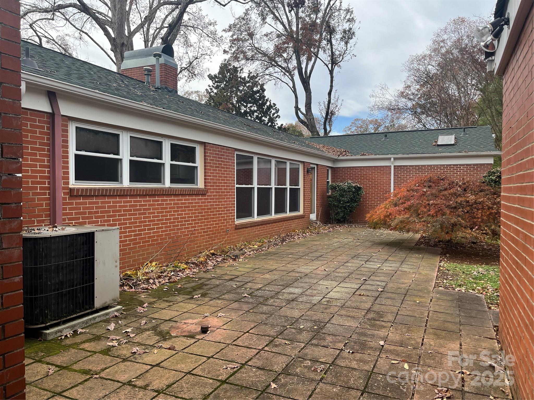 302 Walton Road Morganton, NC 28655 - Photo 20 of 21 a front view of a house with garden