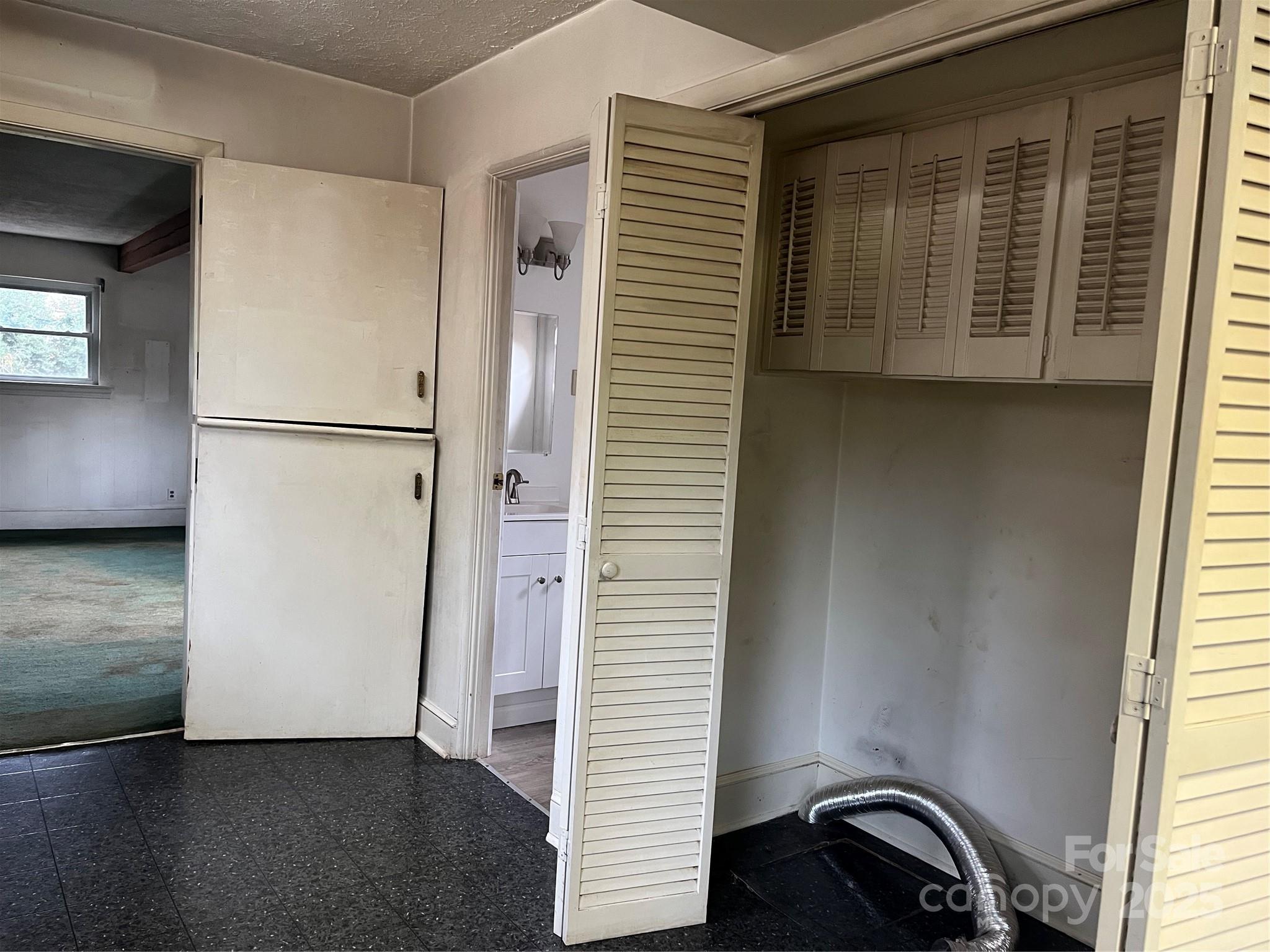 302 Walton Road Morganton, NC 28655 - Photo 5 of 21 a view of a storage & utility room
