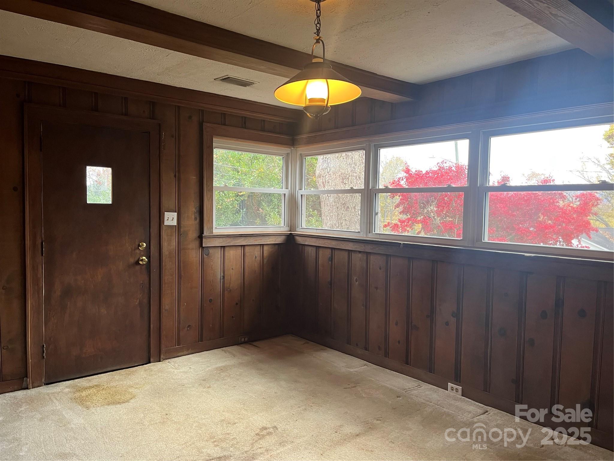 302 Walton Road Morganton, NC 28655 - Photo 7 of 21 a view of an empty room and window