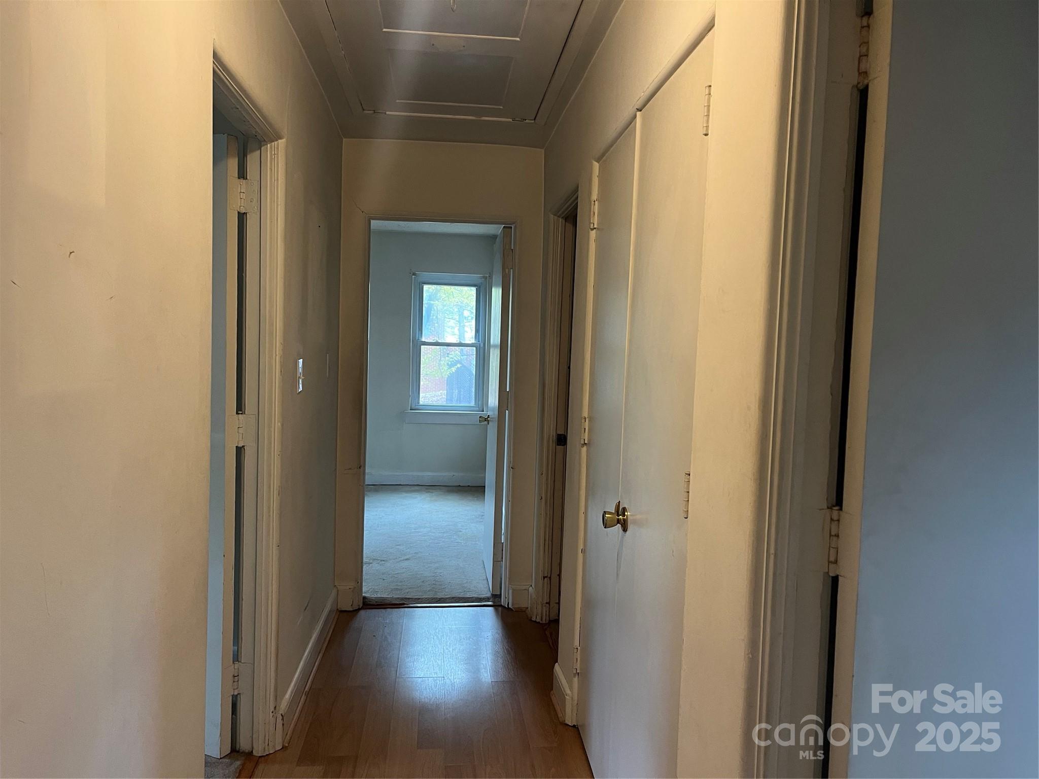 302 Walton Road Morganton, NC 28655 - Photo 8 of 21 a view of a hallway with wooden floor