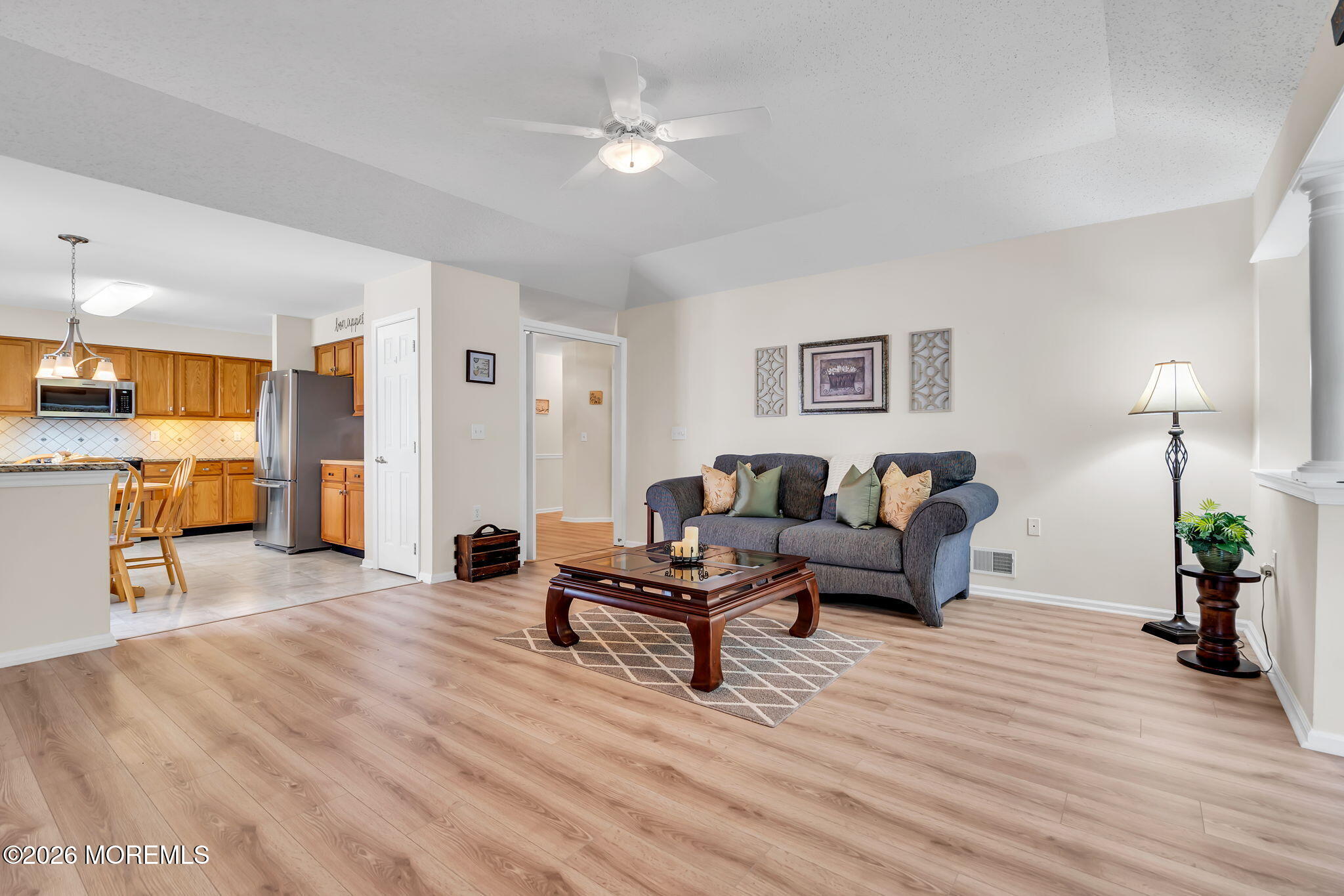 10 Congressional Road Jackson, NJ 08527 - Photo 28 of 72 a living room with furniture and wooden floor