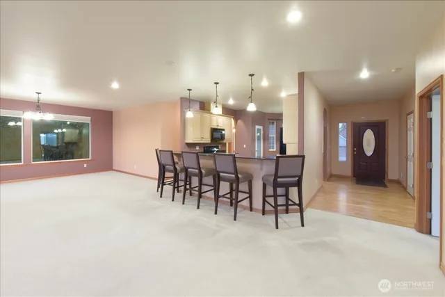 a view of a dining room with furniture