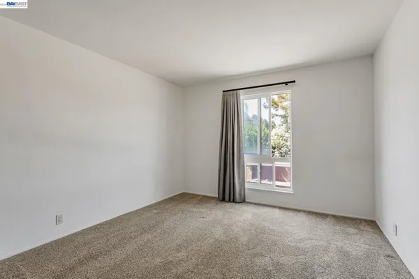 a view of a workspace with furniture