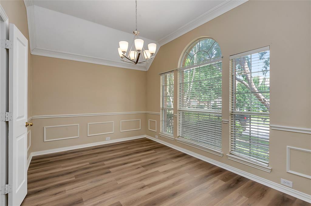 1404 Ranch Hill Drive Irving, TX 75063 - Photo 5 of 31 Dining Room with LVP.