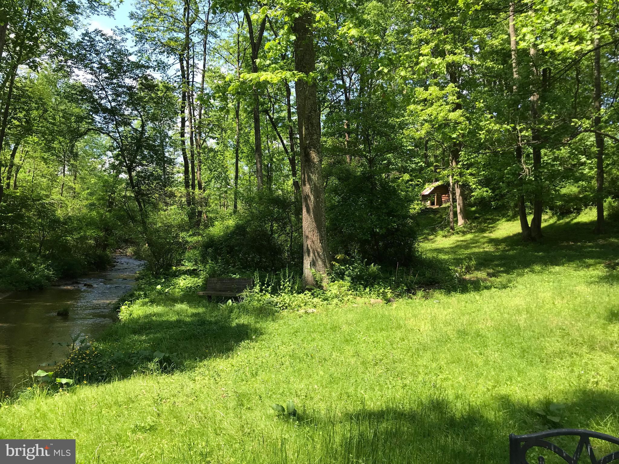 44 Church Road Felton, PA 17322 - Photo 8 of 12 a backyard of a house with lots of green space