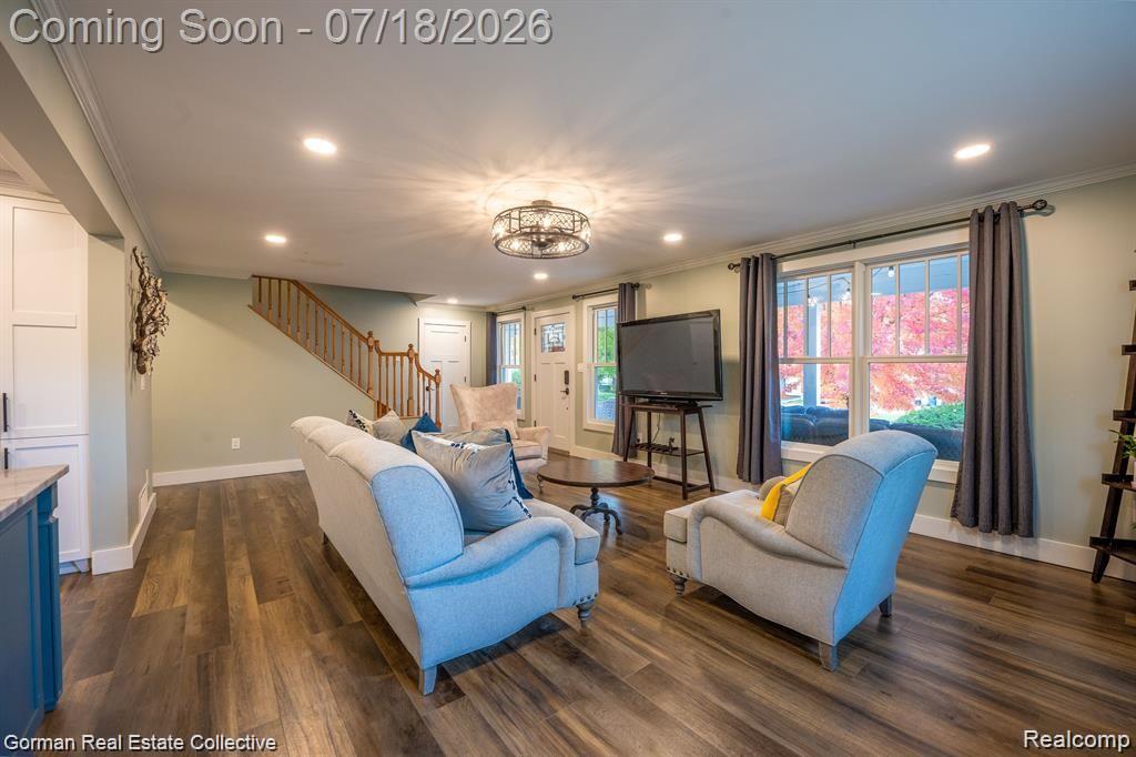 283 Phillips Avenue Clawson, MI 48017 - Photo 5 of 26 Living room. Luxury vinyl plank flooring, brand new ceiling fan, drywall, windows