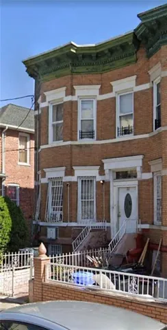 front view of a house with a street