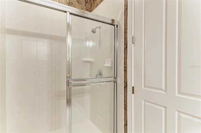 a living room with furniture and windows