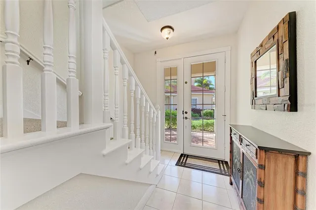 a view of entryway with stairs and wooden floor