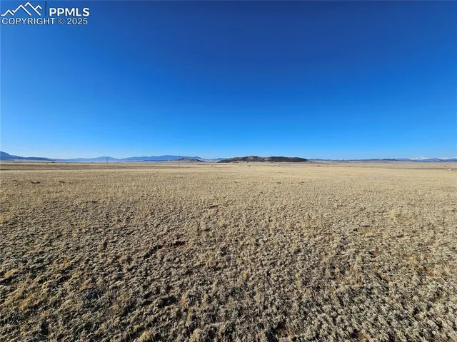 a view of beach and an ocean