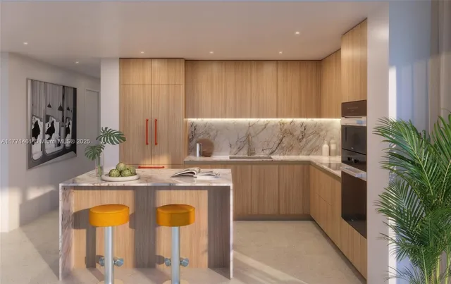 a kitchen with appliances cabinets and furniture