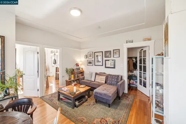 a bed room with a bed and a large window