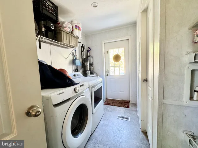 a view of washer and dryer in a utility room