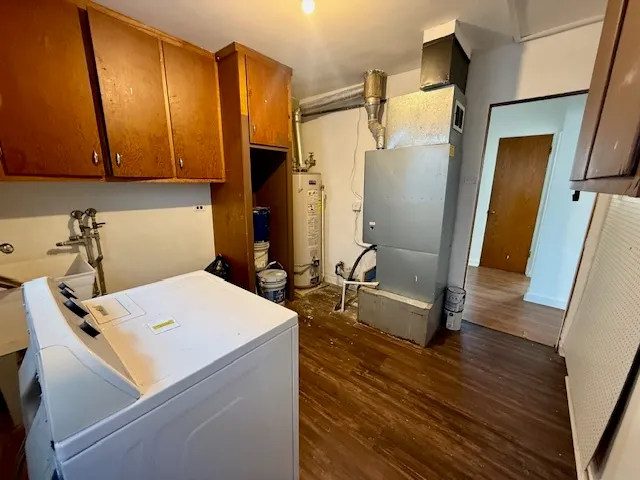 a room with a bed and furniture