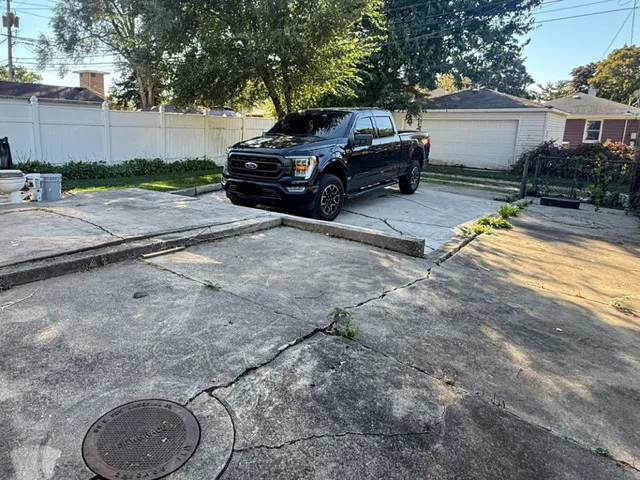 a car parked in front of a house