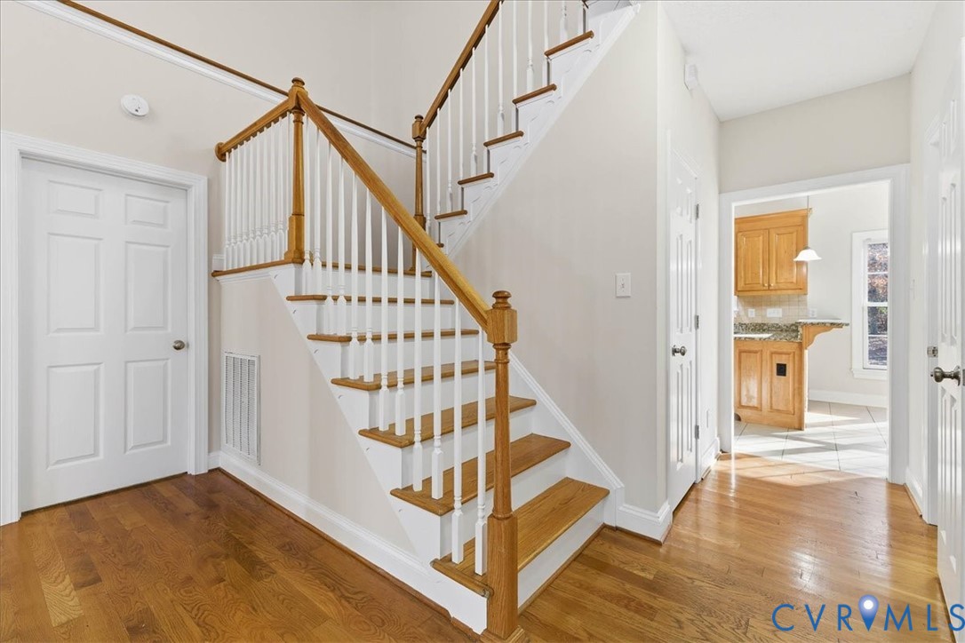 11891 Old Stage Road Prince George, VA 23875 - Photo 12 of 38 Stairway with wood finished floors