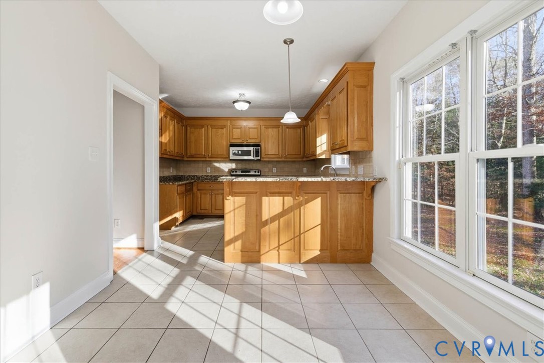 11891 Old Stage Road Prince George, VA 23875 - Photo 25 of 38 view of kitchen and nook from the family room