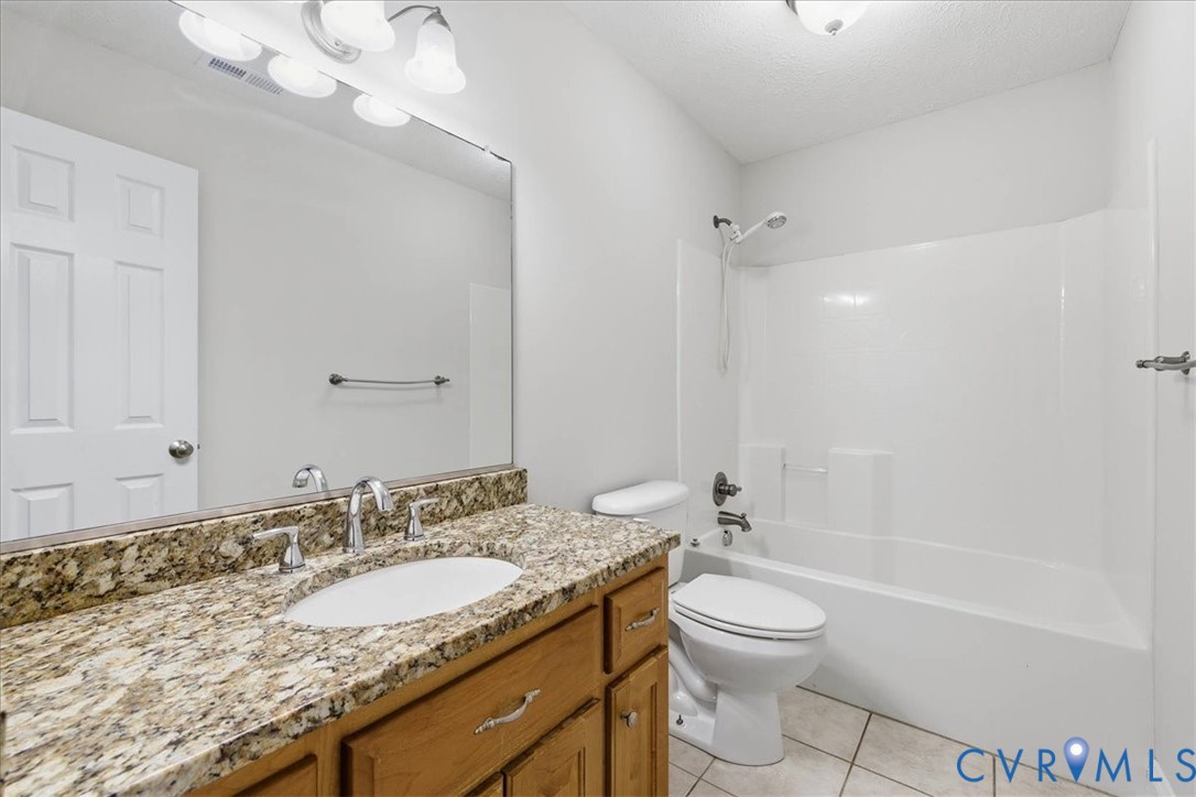 11891 Old Stage Road Prince George, VA 23875 - Photo 33 of 38 hall bath with tub and shower