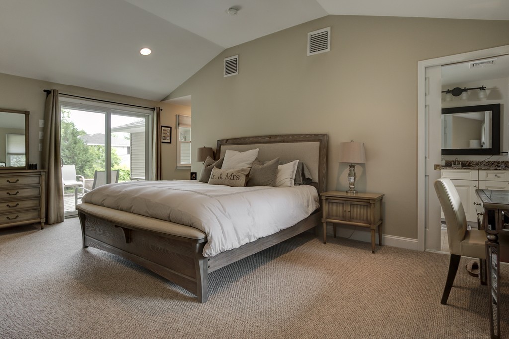 12 Amy Road Framingham, MA 01701 - Photo 11 of 30 a large bedroom with a bed and furniture